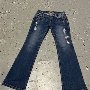 Distressed cello jeans